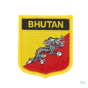 Badge drapeau du Bhoutan, symbole national coloré et distinctif