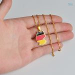 Accessoire or avec motif drapeau allemand
