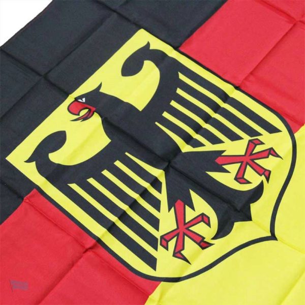 Drapeau noir, rouge et or avec aigle central