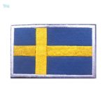Ecusson drapeau Suède, symbole de la culture suédoise