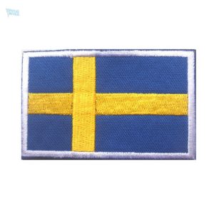 Ecusson drapeau Suède, symbole de la culture suédoise